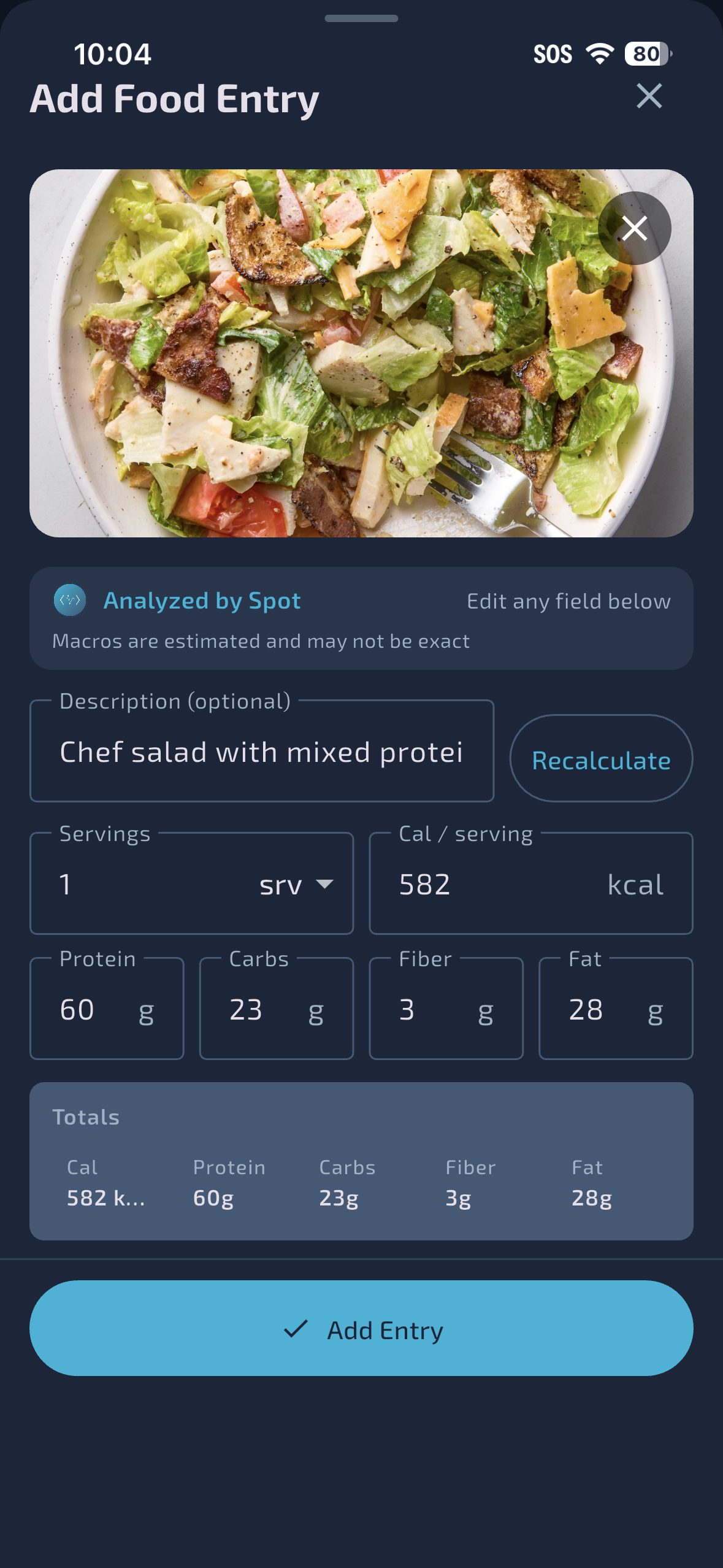 AI meal scanning in dark mode: photo analyzed by Spot with estimated macros